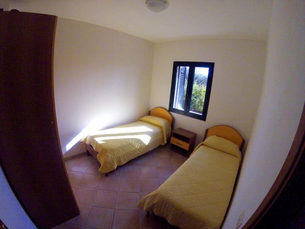 Residence Edilmare San Teodoro Pokoj fotografie