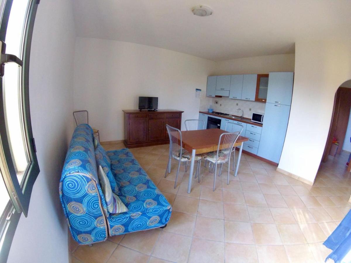 Residence Edilmare San Teodoro Pokoj fotografie